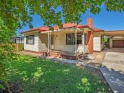 An Established Home On A Generous North Albury Block