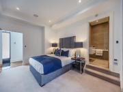 An exclusive penthouse apartment located in a converted...