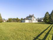 An impressive family home surrounded by splendid rural...