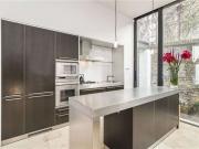 An impressive, unique and modern four bedroom house...