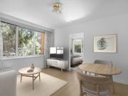 An Inviting First Floor Apartment Moments from Everything