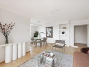 An oasis of quiet privacy showcasing sweeping city views...