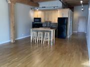 An upscale and unique loft condo in the heart of downtown