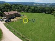 ANCIEN CORPS DE FERME RENOVE AVEC DEPENDANCES SUR 12 000 M2