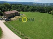 ANCIEN CORPS DE FERME RENOVE AVEC DEPENDANCES SUR 12 000 M2