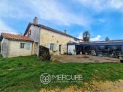 Ancien corps de ferme rénové en pierre 230m² Saint Coutant