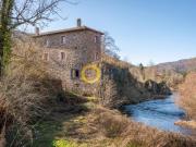 ancien moulin à rénover avec terrain et droit d'eau