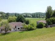 Ancienne ferme quercynoise avec une maison en plain...