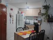 Apartamento 3 dormitórios e uma vaga de garagem.