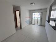 Apartamento com dois quartos uma suite e piscina