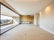 Apartamento com varanda integrada e três suítes em...
