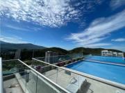Apartamento con vista lateral cerca al mar en Playa...