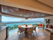 Apartamento reformado frente mar com varanda gourmet e...