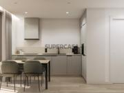 Apartamento T0+1 com garagem, terraço e jardim no...