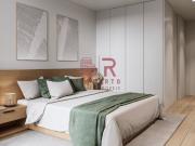 Apartamento T2, com 2 suítes, varanda, jardim e garagem