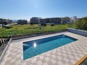 Apartamento T2 novo com garagem, piscina e vista mar, a...
