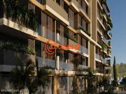 Apartamento T2 novo com piscina e garagem no centro de Faro