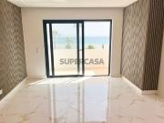 Apartamento T2 renovado com vista mar e garagem em Quarteira