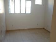 Apartamento tãrreo em rua residencial