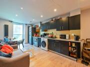 Apartment at Muirfield Crescent, London
