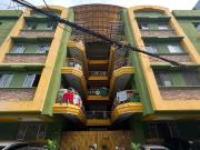 Apartment building with income and corner house for sale