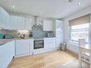 apartment in Kingston Road, South Wimbledon, London,...