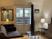 Apartment with balcony, view around Eiffel and into...
