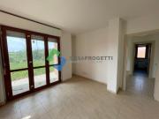 Appartamento bilocale con giardino e garage di nuova...