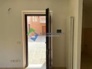 Appartamento bilocale con giardino e garage di nuova...