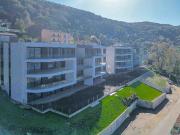 Appartamento con giardino e vista lago a Montagnola