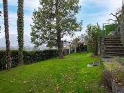 Appartamento con giardino in casa bifamiliare