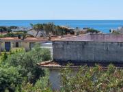 Appartamento con terrazzo vista mare e giardino