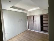 Appartement à louer 77 m² à Bouskoura