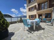 Appartement avec grande terrasse et places de parc |...