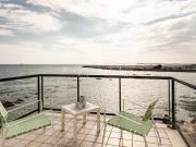 Appartement avec terrasse en bord de mer