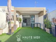 Appartement avec terrasse en bord de mer