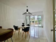 Appartement avec terrasse en bord de mer