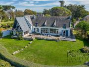 Propriété en bord de mer avec jardin