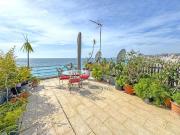 Appartement avec terrasse en bord de mer