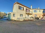 APPARTEMENT AVEC TERRASSE, VERANDA ET PLACE DE PARKING