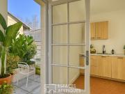 Appartement duplex rénové en coeur de ville avec...