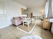 Appartement F1/2 balcon et 1 place de stationnement en sous