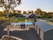 Architectural Acreage Oasis with Every Luxury Considered