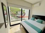 Arriendo por dias Apartasuite con Balcón y Piscina en El...