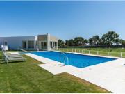 Ático de lujo con solárium privado y vistas al mar y al golf