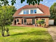 Attraktives Einfamilienhaus mit Einliegerwohnung in...