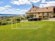Außergewöhnliches Dreifachhaus mit Panoramablick auf den See