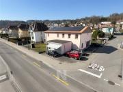 Bau von 4 Wohnungen mit Anbauten im Zentrum von Lucens