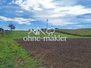 Baugrundstück in ruhiger Lage und sehr nahe den Feldern
