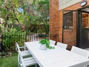 Beachside Brilliance: Solid Townhome in Prestigious...